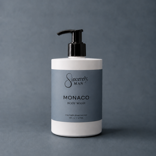 Body wash bottle labeled 'Sincerely, Man Monaco' on a gray background