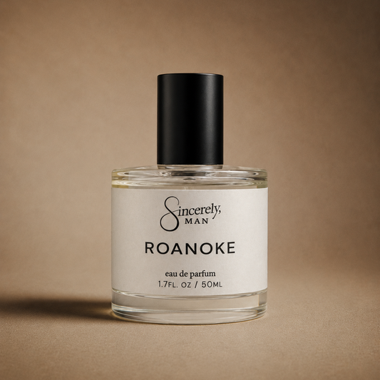 Perfume bottle labeled 'Sincerely, Man Roanoke' on a brown background
