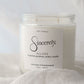 Scented candle labeled 'Sincerely' on a light background