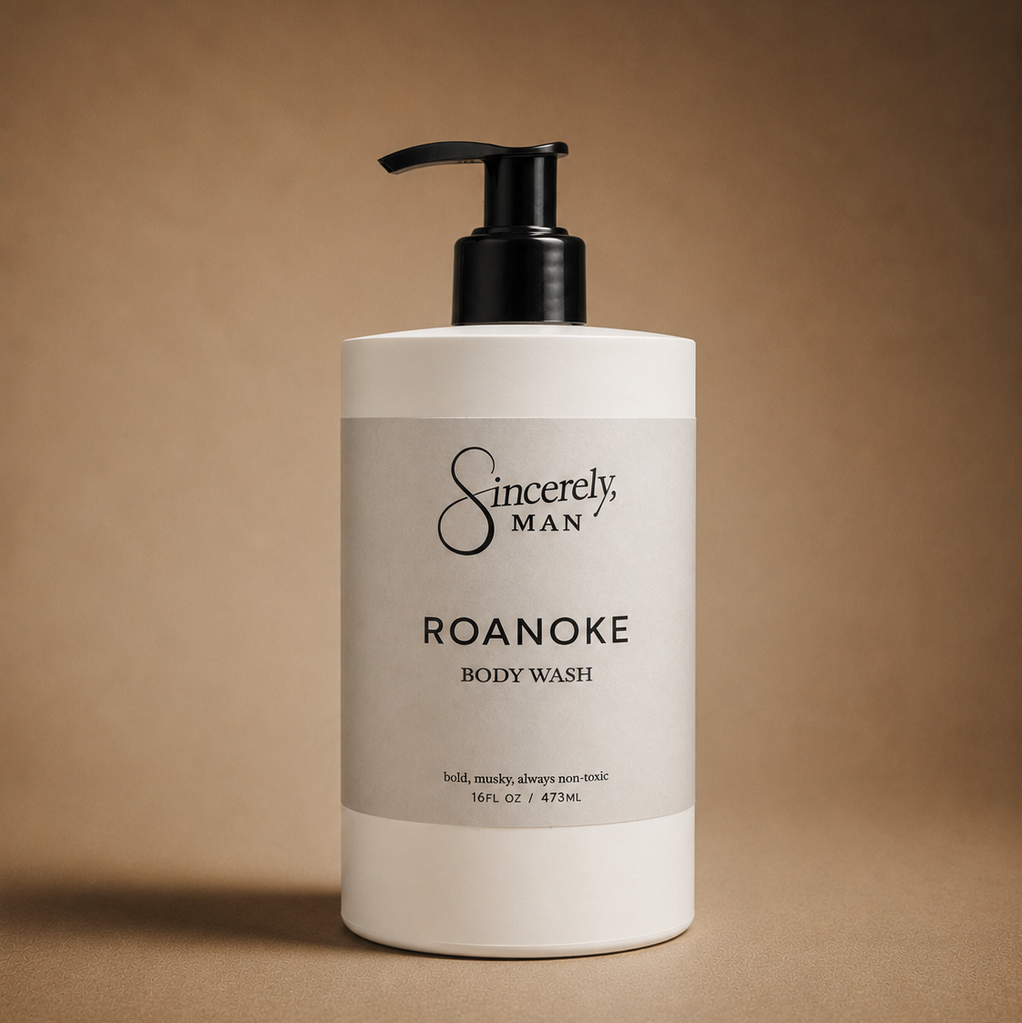 Body wash bottle labeled 'Sincerely, Man Roanoke' on a brown background