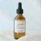 Bottle of 'Sincerely' diffuser oil on a white surface with a light gray background
