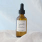 Bottle of Sincerely Soleil product on a light background