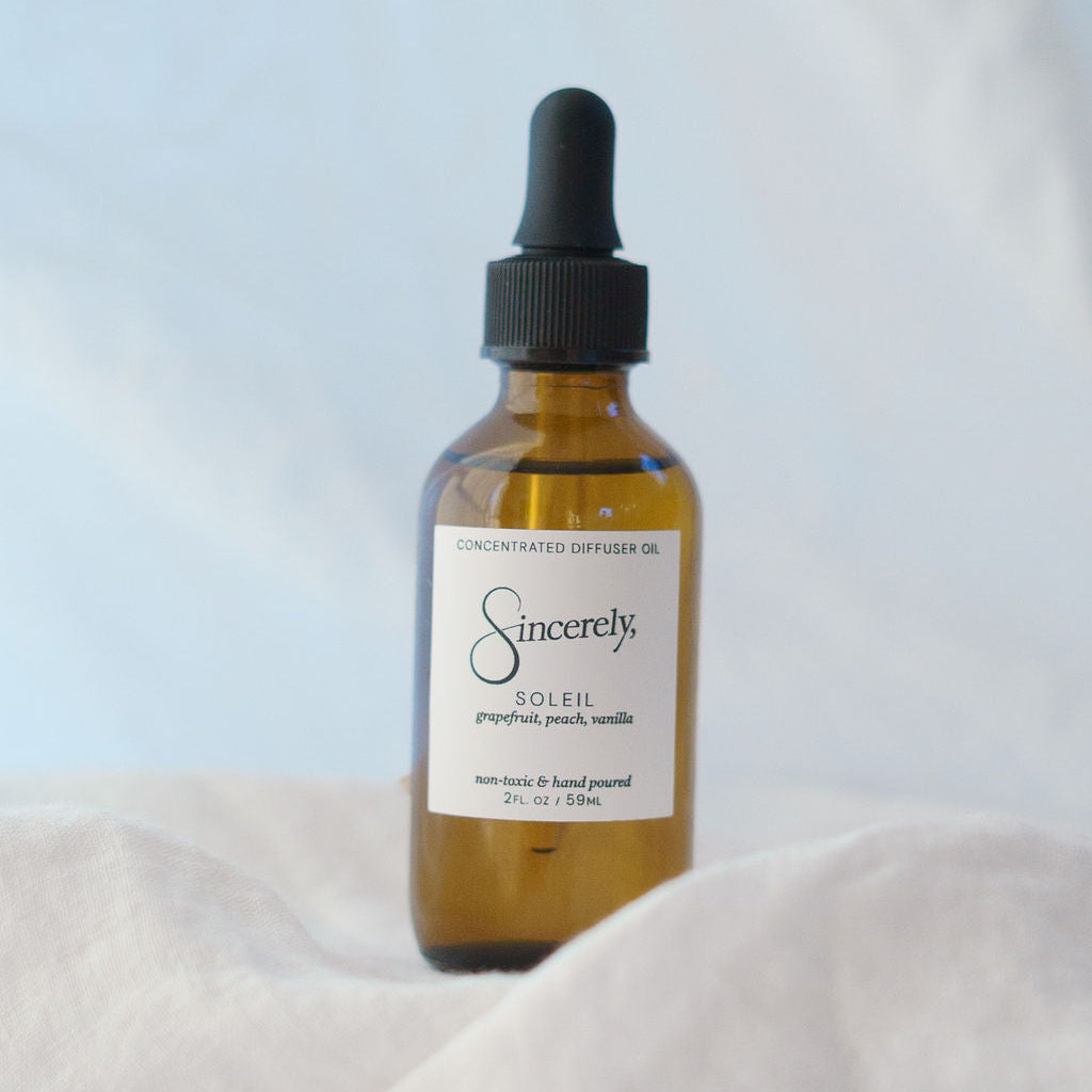 Bottle of Sincerely Soleil product on a light background